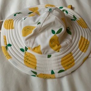 Gently used Hanna Andersson lemons swim hat. Size XXS